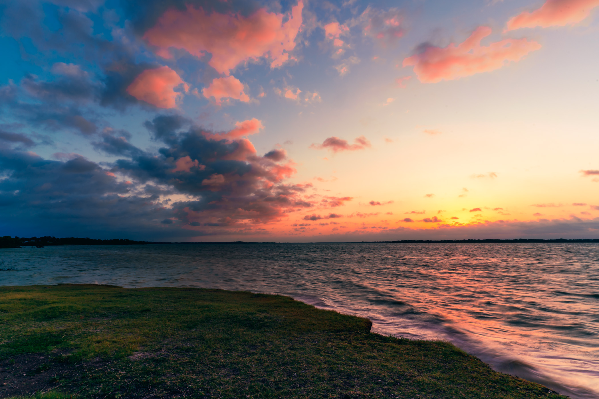 The sun rises on North Texas' Lake Lavon.