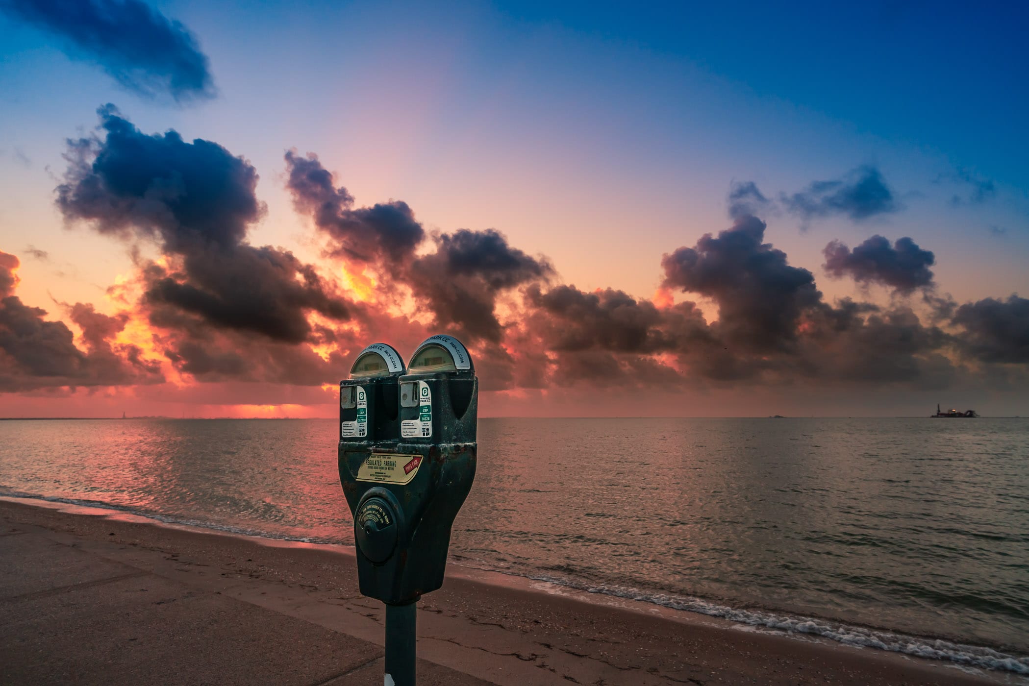 Parking meters greet the morning sun at North Beach, Corpus Christi, Texas.