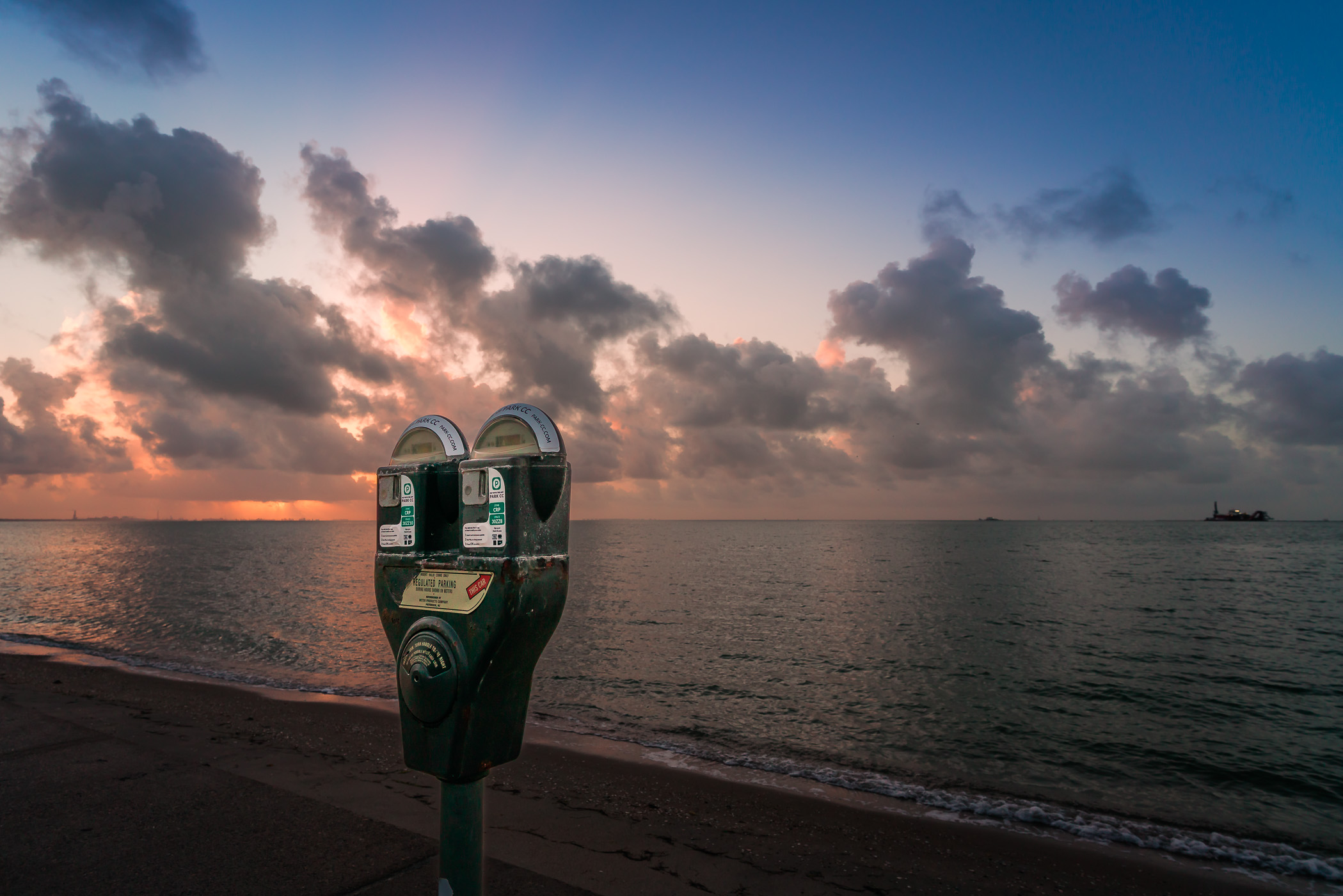 Parking meters greet the morning sun at North Beach, Corpus Christi, Texas.