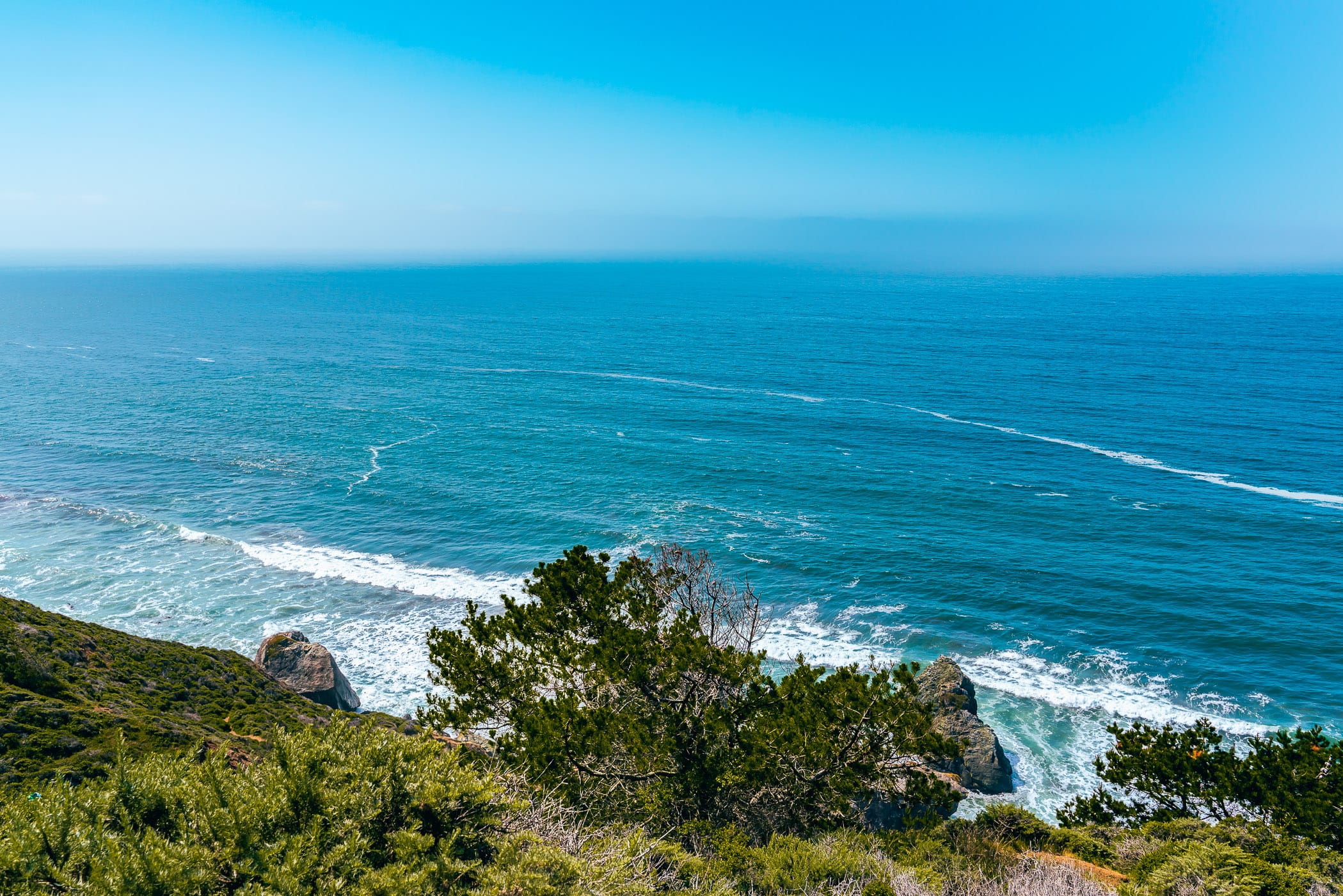 The Pacific Ocean stretches to the horizon as seen from Red Rock Beach near Stinson Beach, California.