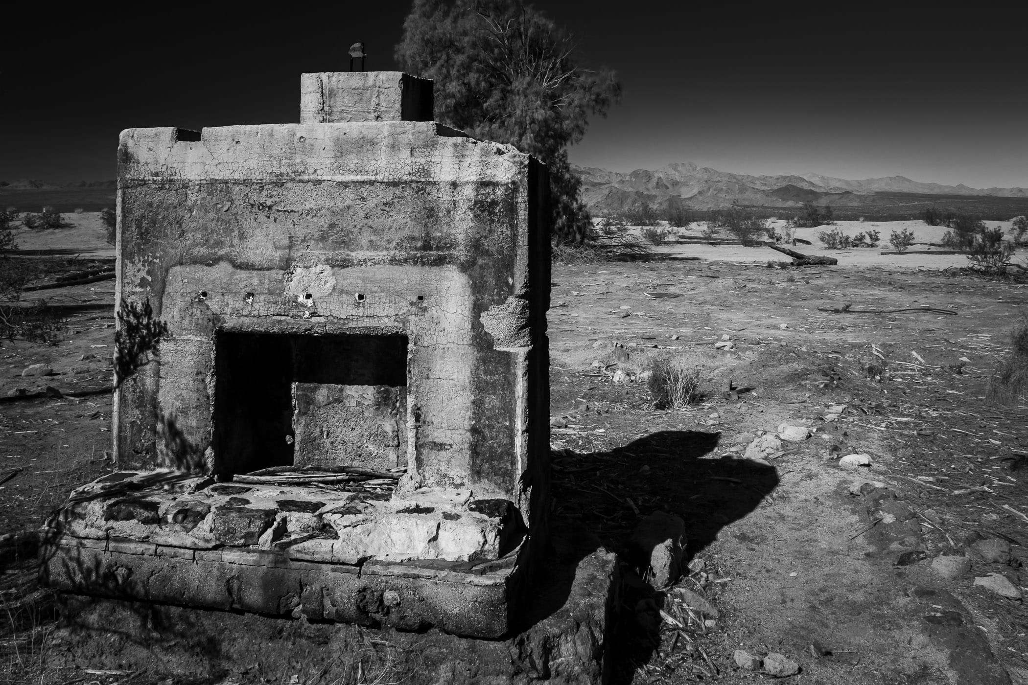 The remains of a fireplace in the desert at the ghost town of Kelso, California, deep in the desert of the Mojave National Preserve.