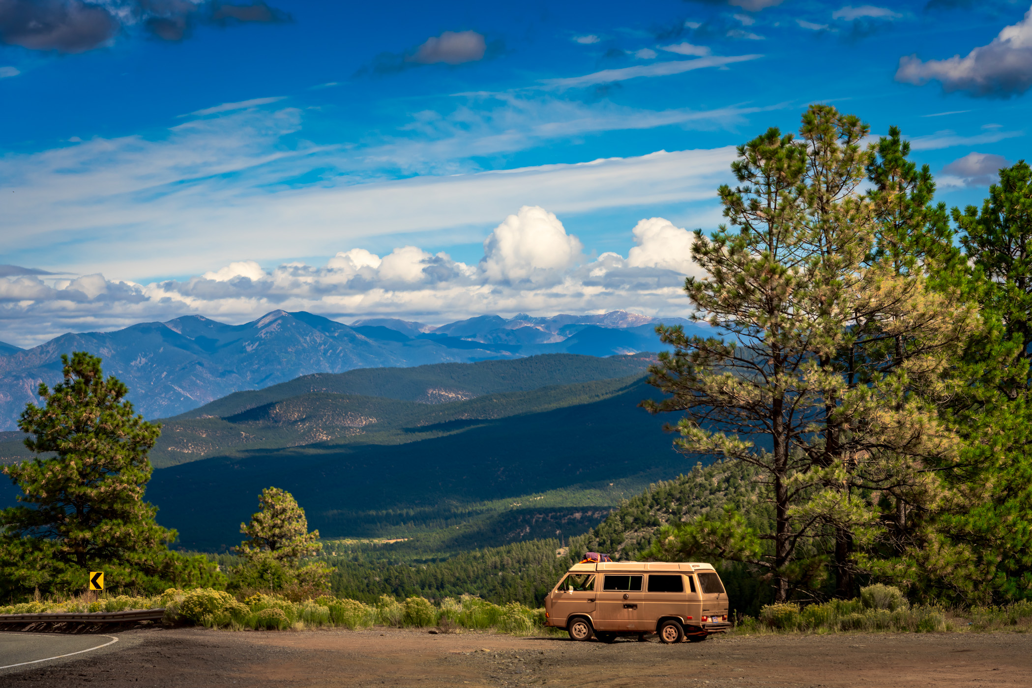 A Volkswagen Type 2 (T3)—or Vanagon—on a roadside turn out in the mountains near Taos, New Mexico.