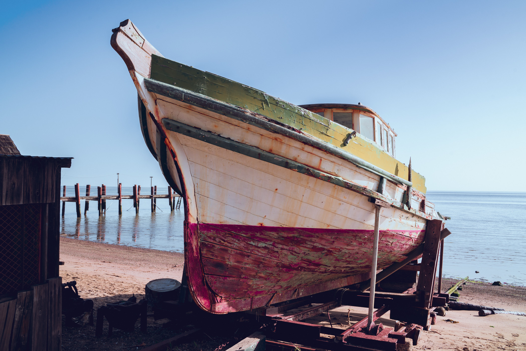 A boat dragged ashore at China Camp Village in China Camp State Park near San Rafael, California.