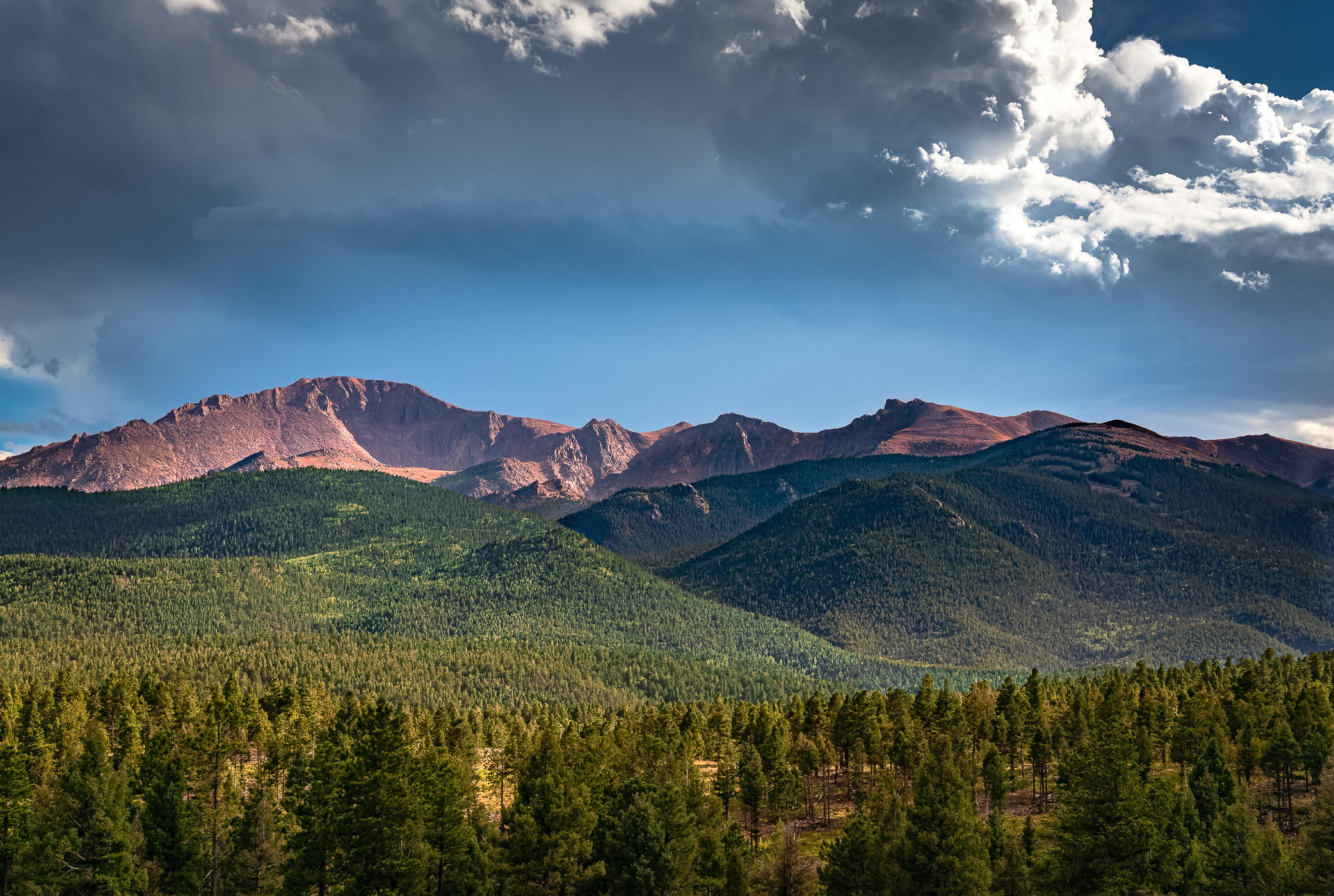 Pikes Peak stretches across the horizon near Colorado Springs, Colorado.