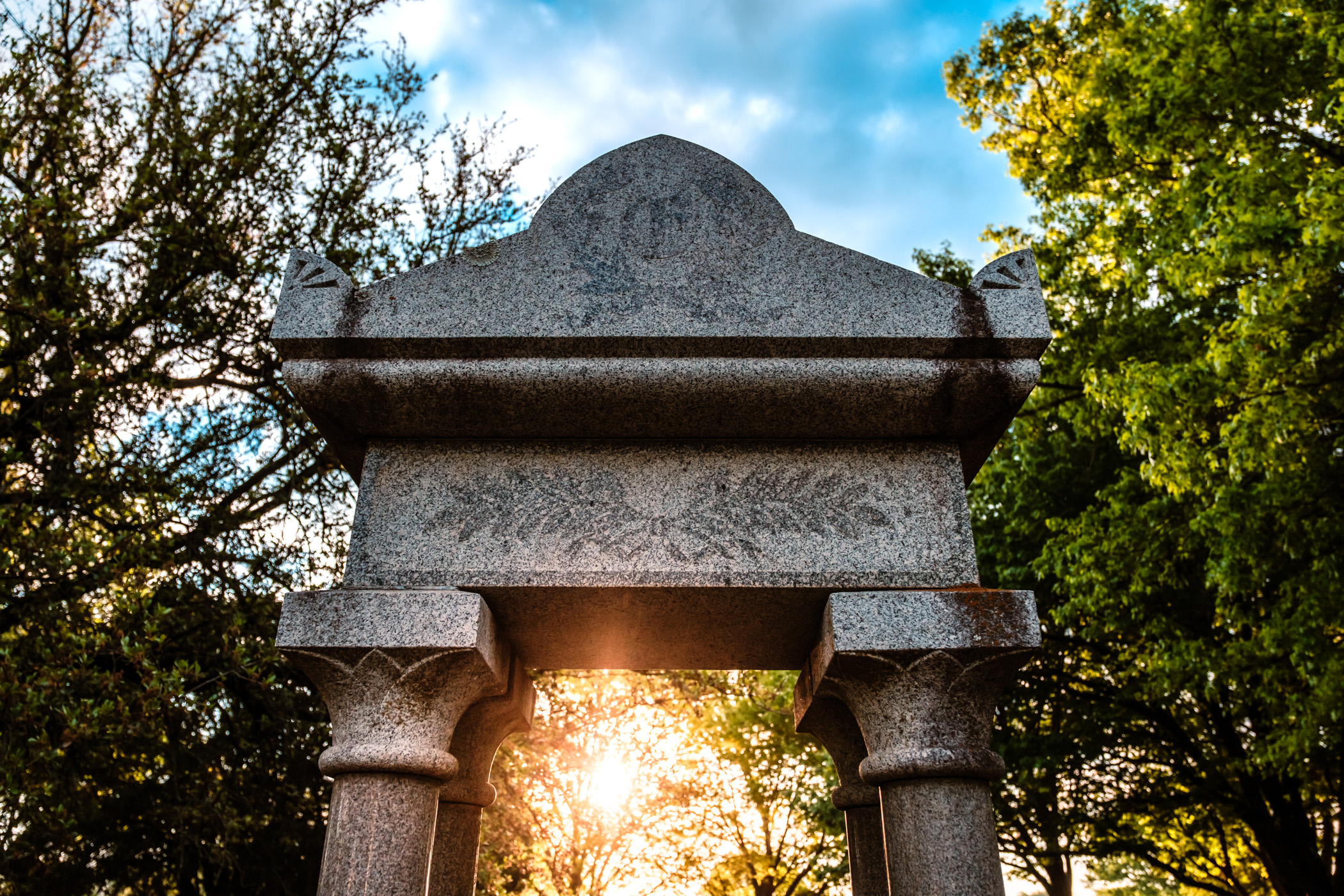 The sun rises on Pecan Grove Cemetery, McKinney, Texas.