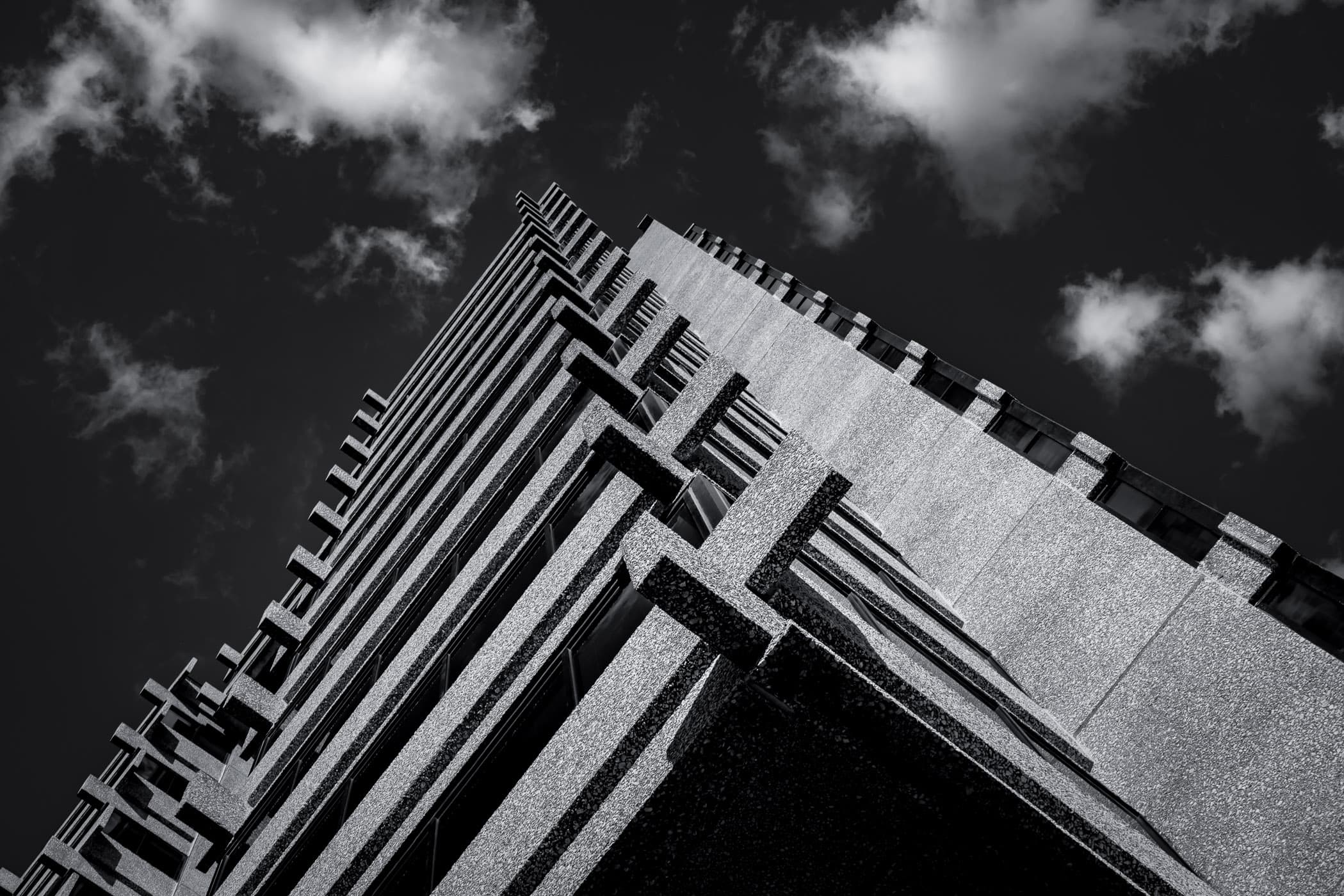 The architectural details of Dallas' Pegasus Villas, which was once Brookhollow Plaza, are a testament to the city's rich design heritage. This landmark showcases the visionary work of architect Paul Rudolph, featuring a 16-story structure that was originally built in the late 1960s. The building stands out with its precast concrete beams and columns, and its history as a re-purposed office building turned into a senior living community adds to its unique character.