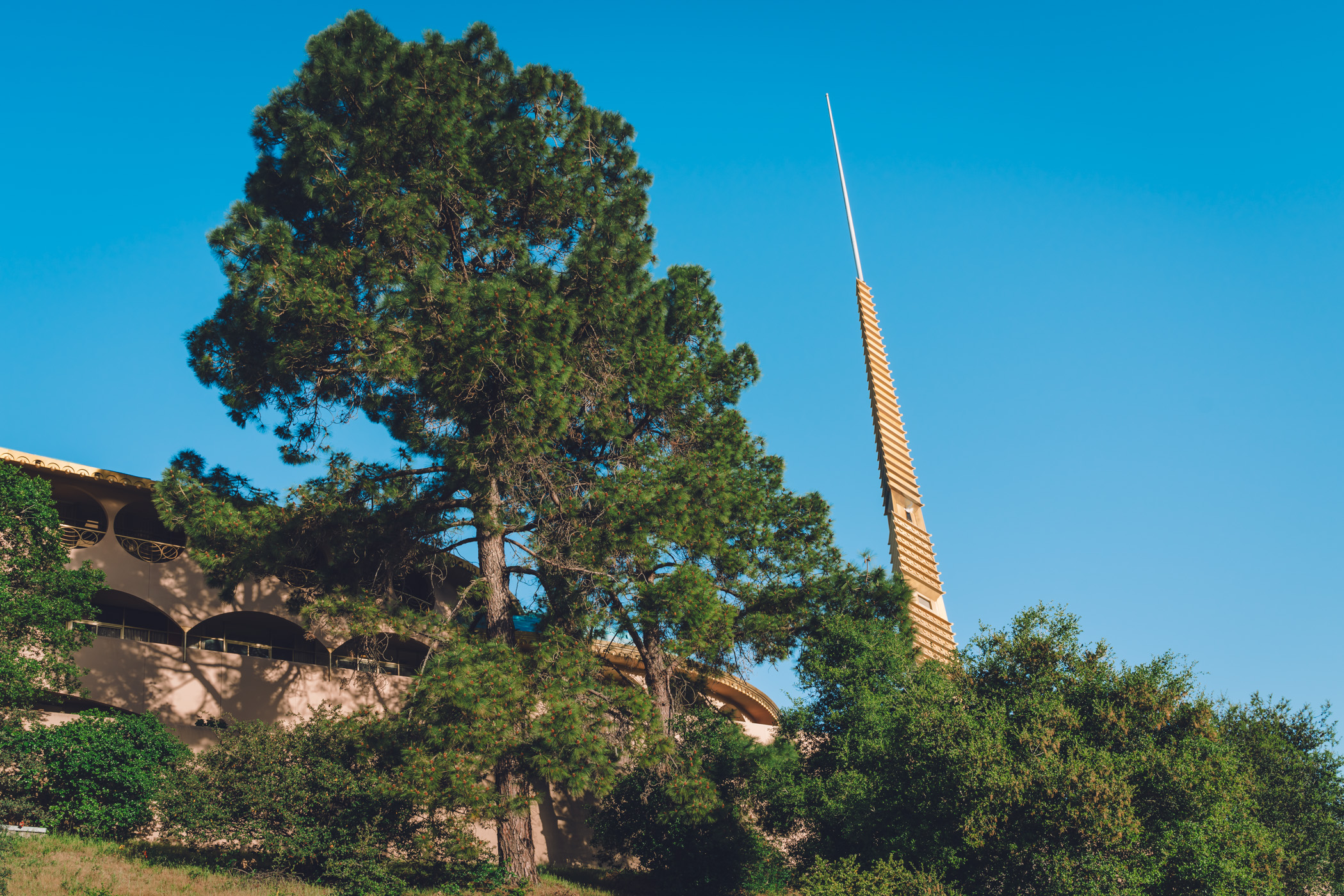 The 172-foot (52 m) spire of the Frank Lloyd Wright-designed Marin County Civic Center pierces the morning sky over San Rafael, California.