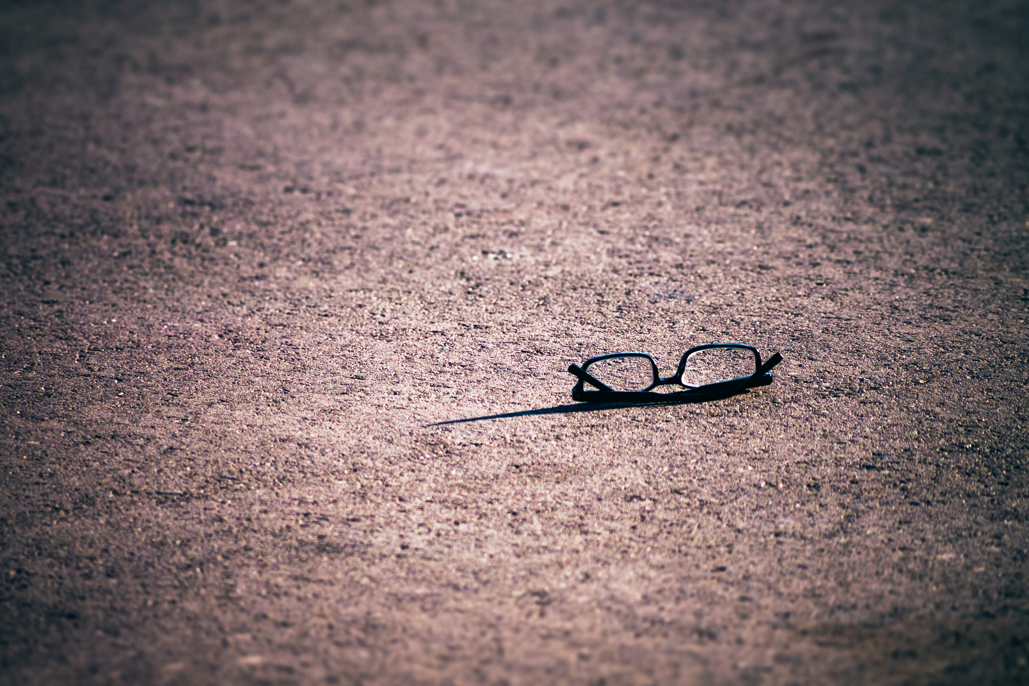 A lost pair of eyeglasses, found on a sidewalk along San Francisco's Embarcadero near Pier 35.