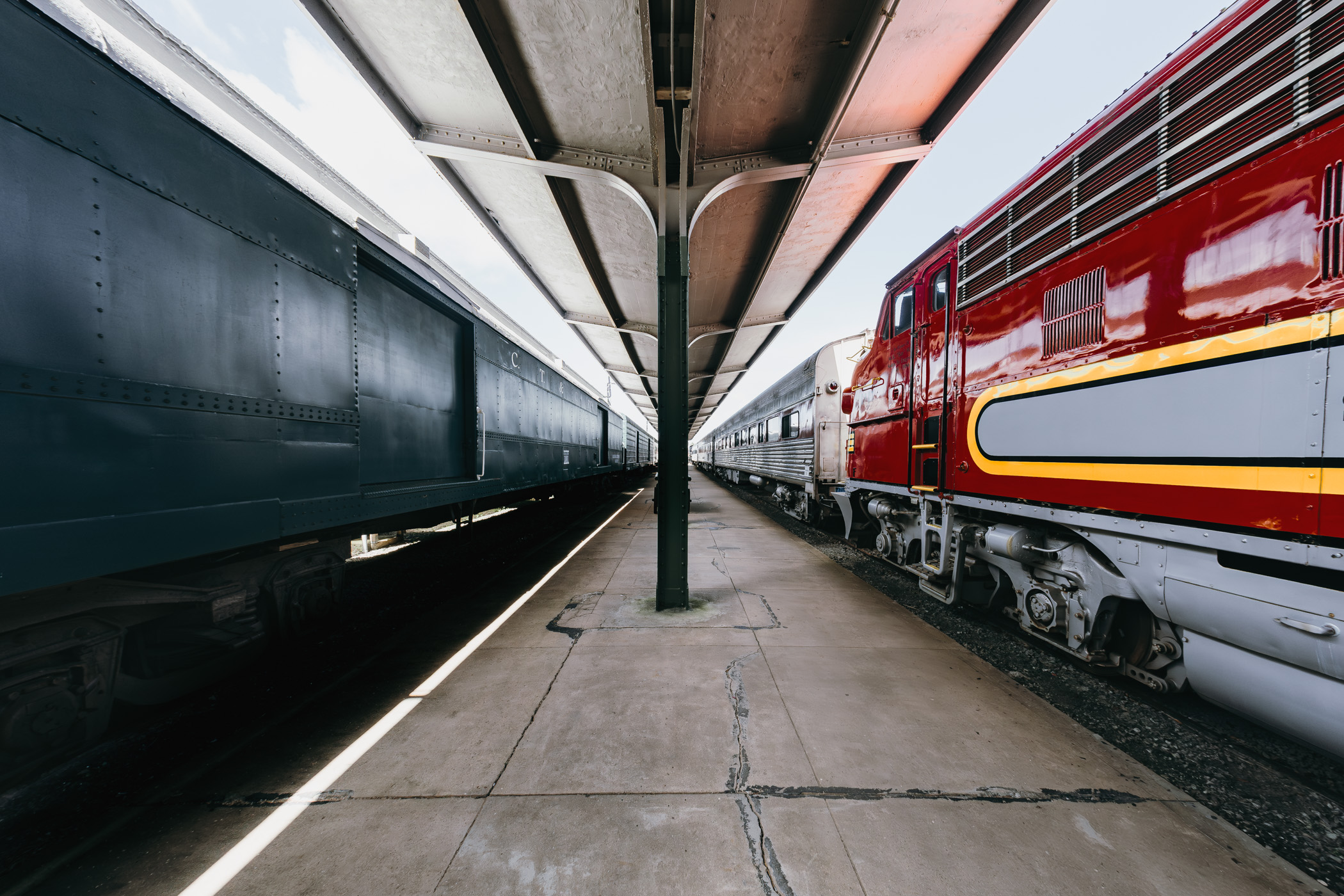 Trains lead into the distance at the Galveston Railroad Museum, Texas.