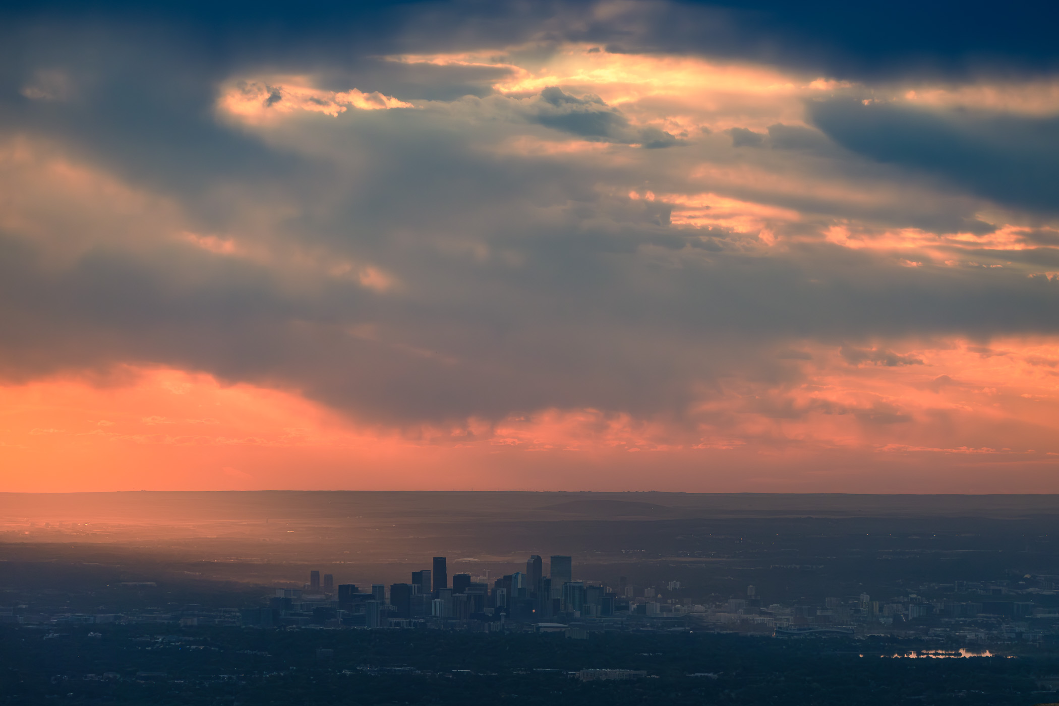 The Denver skyline in the early-morning light, as seen from White Ranch Park near Golden, Colorado, approximately 26 kilometers (16 miles) away.