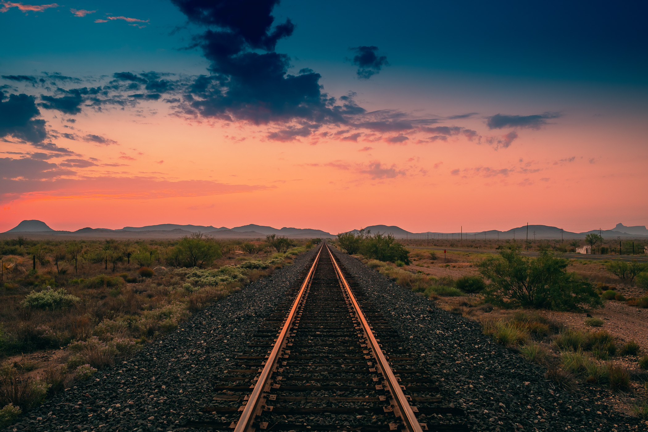 The sun rises on the Chinati Mountains near Marfa, Texas.