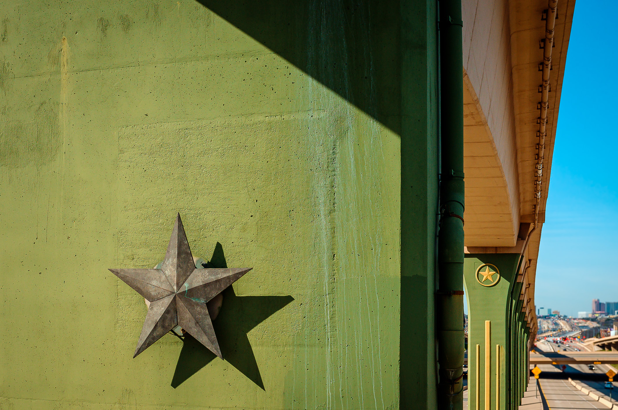 A decorative star on a bridge pylon at Dallas, Texas' High Five freeway interchange.