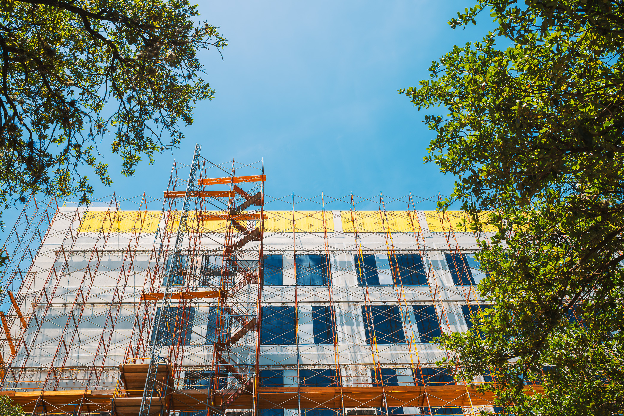 Whether intentional or not, this burnt orange scaffolding—matching the University of Texas’ signature color—climbs the exterior of the under-construction Engineering Discovery Building. 